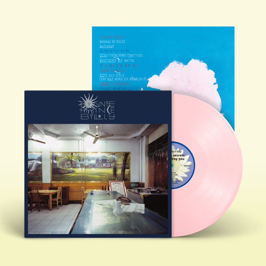 Pink vinyl record with a restaurant scene album cover and blue inner sleeve.