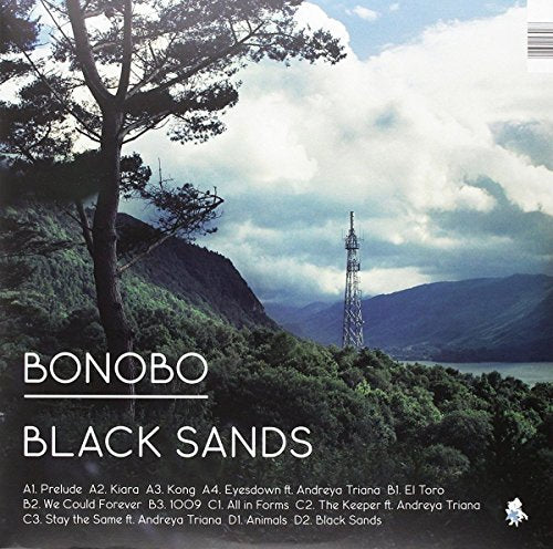 Bonobo’s “Black Sands” vinyl album cover: a silhouetted tree against a hazy landscape.