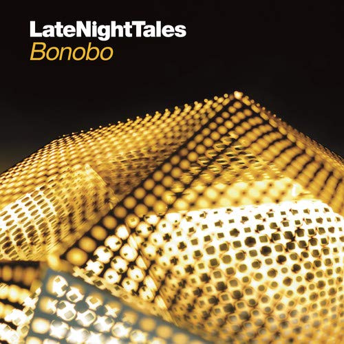 Bonobo’s “Late Night Tales” vinyl album cover with golden, blurred lights.
