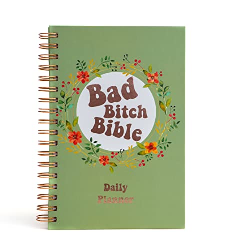 Green spiral-bound planner with floral wreath and text "Bad Bitch Bible".