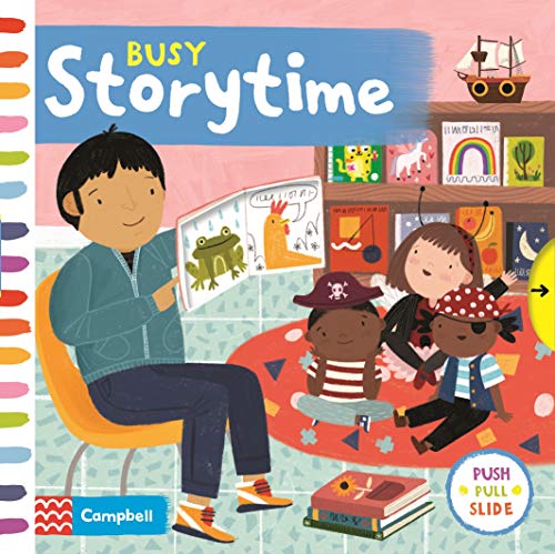 Children listen to a person reading a book with interactive elements.