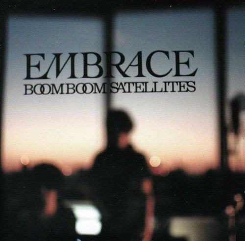 CD cover for Boom Boom Satellites’ “Embrace” with a silhouetted figure.