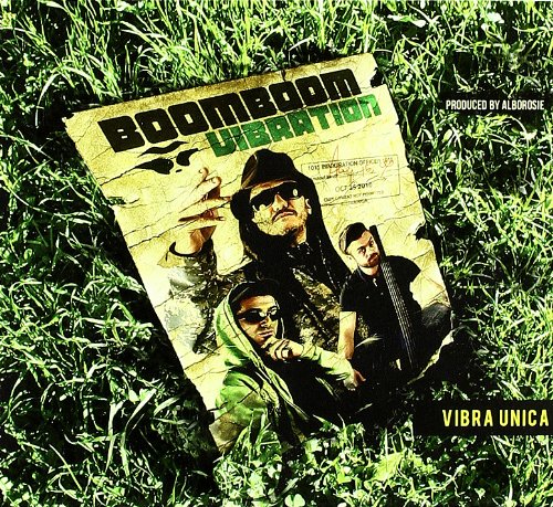 CD cover featuring three men with sunglasses in camouflage, lying in grass.