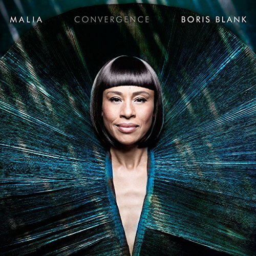 Portrait of a woman with radiating blue lines, album cover art.