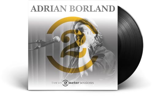 Adrian Borland album cover with vinyl record, black and white portrait.