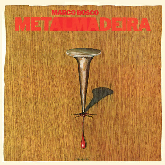 Vinyl album cover: red text, nail image on woodgrain background.