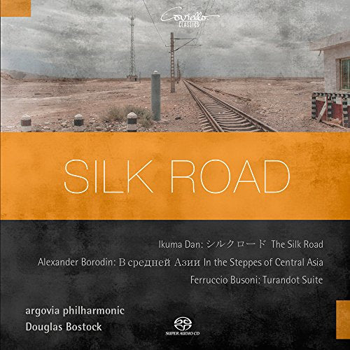 CD cover with "Silk Road" text, train tracks, and desert landscape.