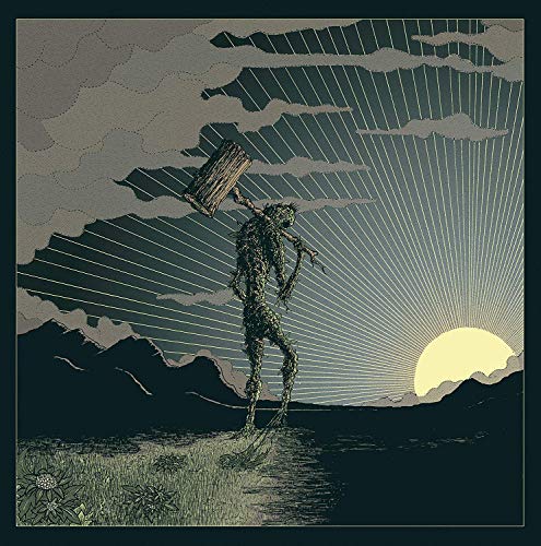 A moss-covered figure walks on a path at sunset, carrying a wooden object.