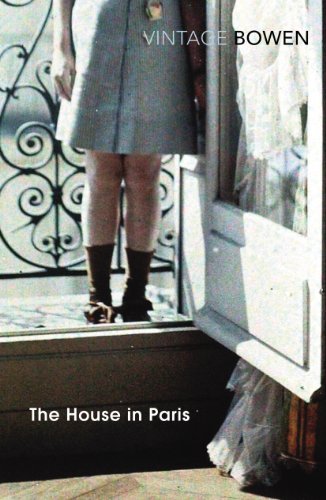 A person in a light skirt and dark socks stands in a doorway.