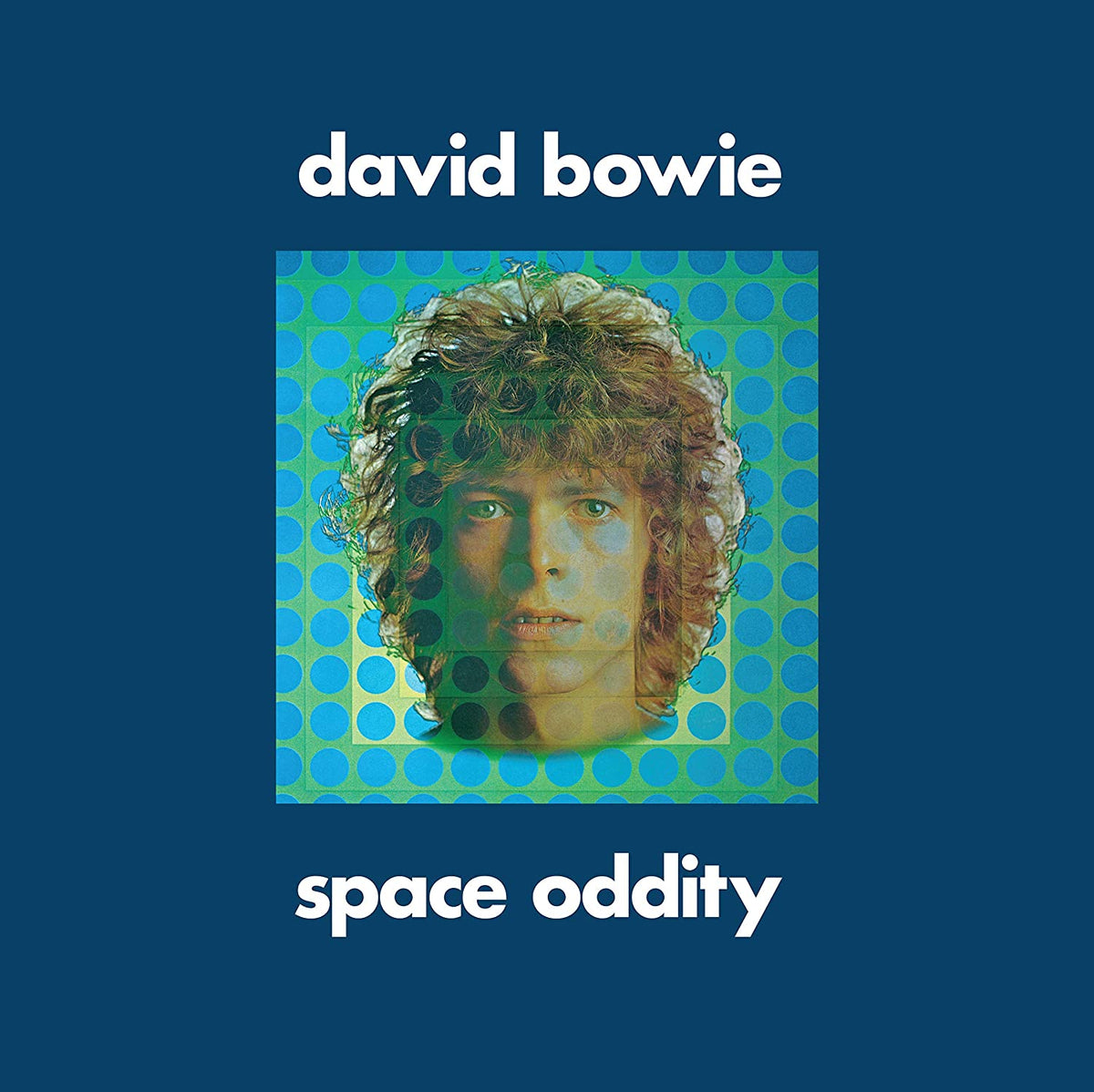 "Blue album cover with David Bowie's face and 'Space Oddity' text."