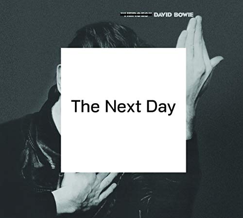David Bowie album cover, "The Next Day," with obscured face.