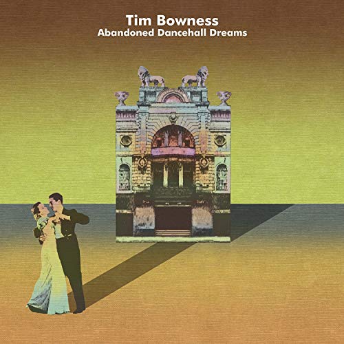 "Album cover with couple dancing in front of an ornate building, gradient brown background."
