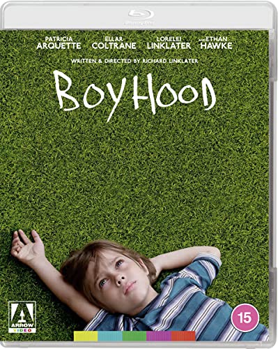 Boyhood" Blu-ray cover: a young boy lying in green grass, looking up.