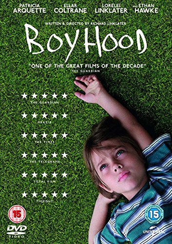Boyhood" DVD cover featuring a young boy lying in green grass, looking up.
