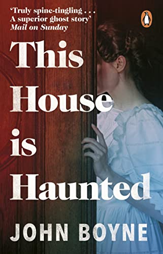 Book cover: "This House is Haunted" with a woman’s hand on a door.