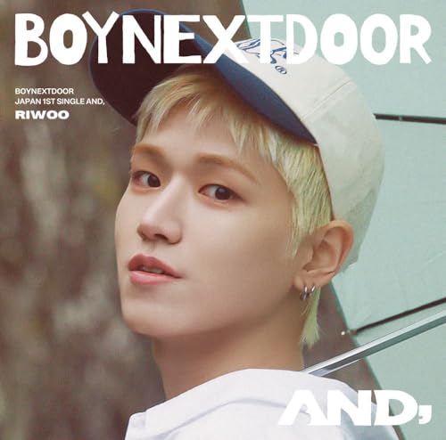 Close-up portrait of Riwoo from Boynextdoor wearing a baseball cap.
