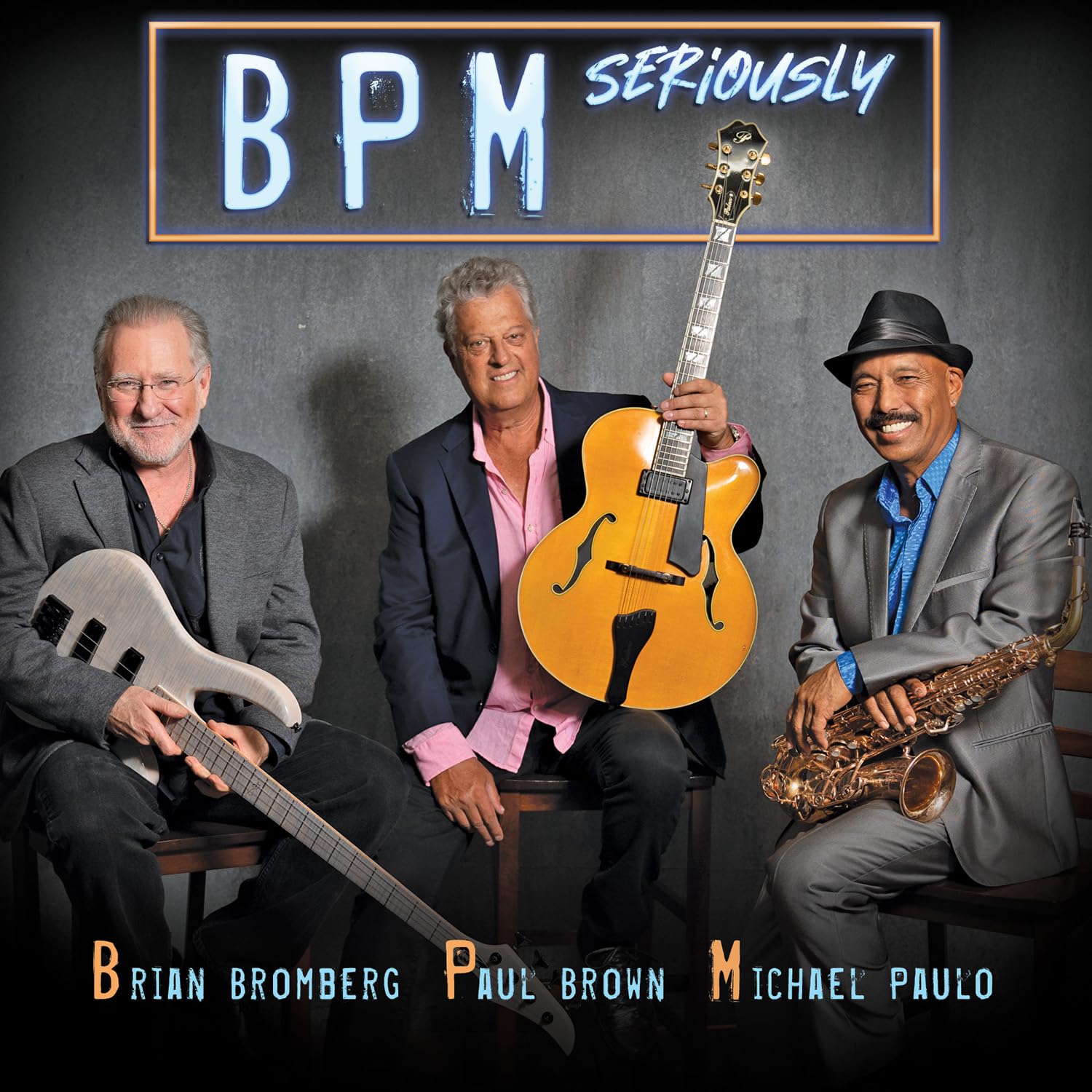 CD cover featuring four musicians with guitars and a saxophone.