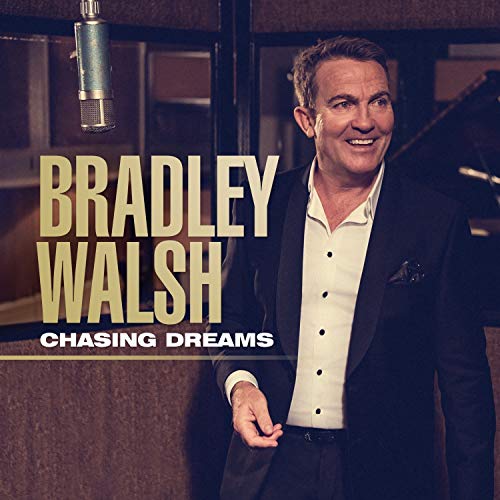 Bradley Walsh album cover, featuring him in a suit near a microphone.