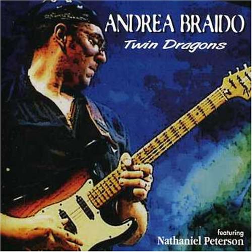 CD cover: Andrea Braido playing electric guitar, blue background.