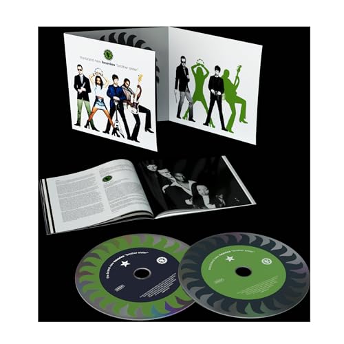 Open CD case with two discs, booklet, and band photo inside.