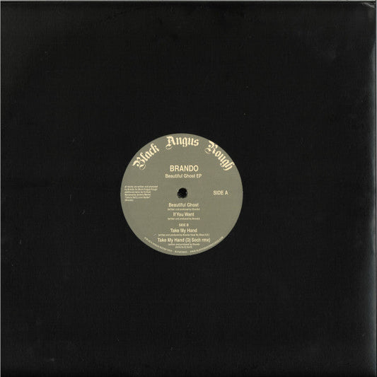 Black vinyl record with a cream-colored label displaying song titles.