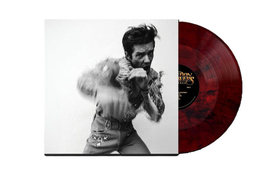 Brandon Flowers album cover with a black and white portrait next to a marbled vinyl.