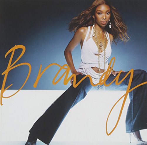 Brandy album cover featuring the artist in jeans and a white top.