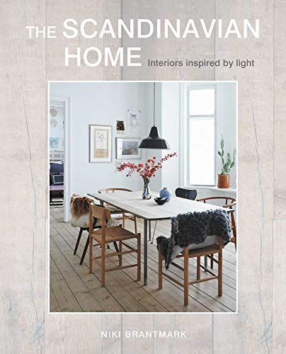 Book cover featuring a bright, minimalist Scandinavian dining room interior.