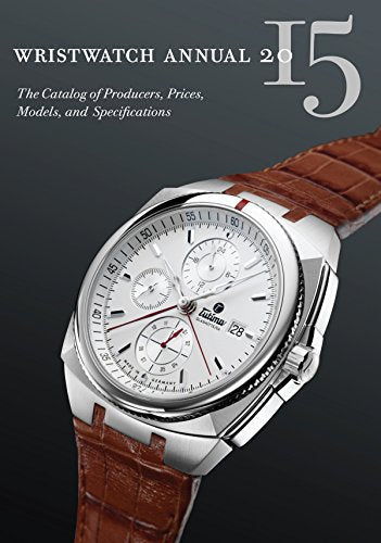 Close-up of a silver wristwatch with a brown leather strap and white face.