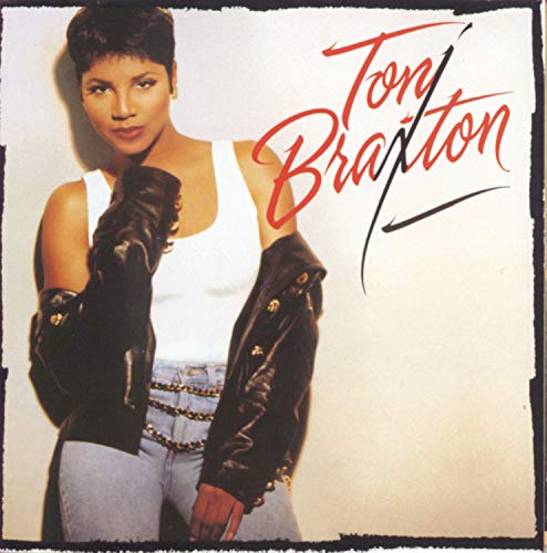 Toni Braxton album cover: portrait of singer in denim and leather.