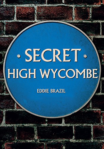 Blue circular sign on a brick wall reading Secret High Wycombe by Eddie Brazil.