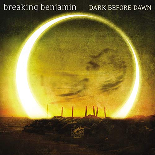 Album cover showing a glowing solar eclipse over a rocky shoreline at sunset.