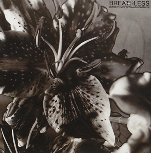 Black and white CD cover with a close-up of spotted lilies.