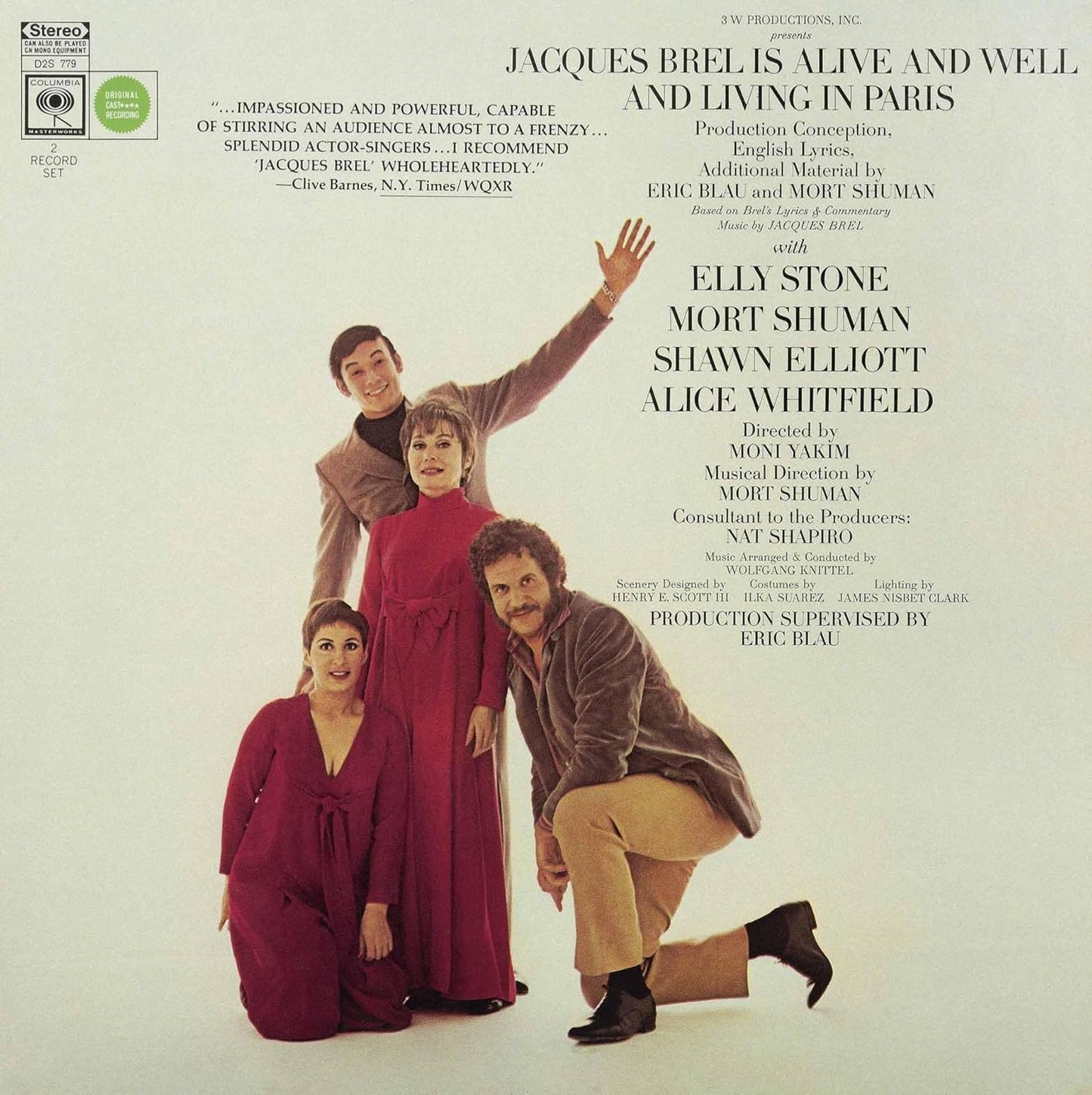 Album cover featuring four performers in stage attire, arms outstretched.