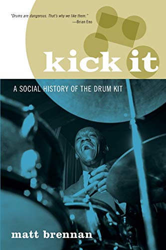 Book cover featuring a blue-toned photo of a smiling drummer playing a drum kit.