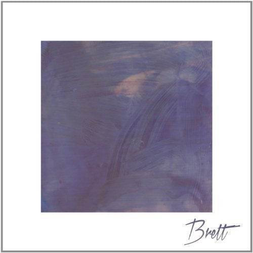 Dark purple vinyl record with abstract swirls and the name "Brett".