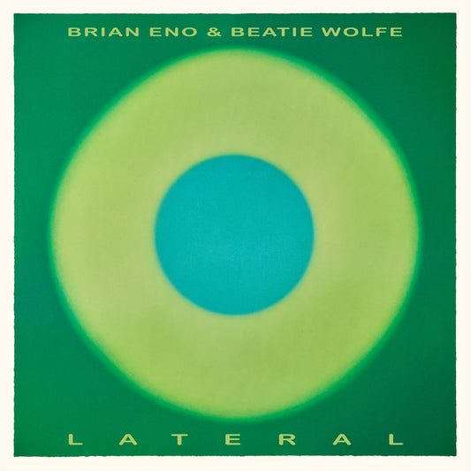 Album cover with Brian Eno and Beatie Wolfe text over a green circular gradient.