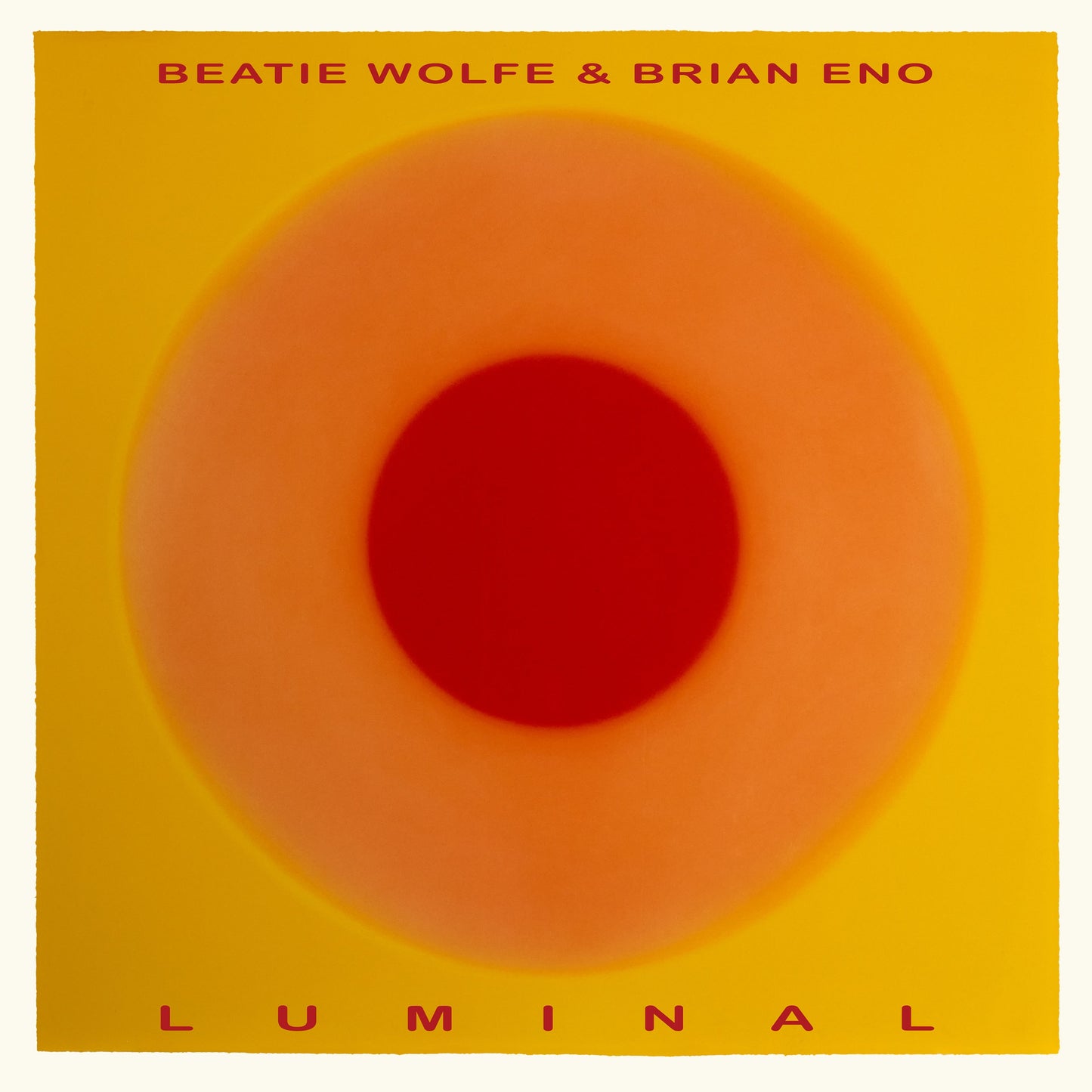 Album cover for "Luminal" by Brian Eno & Beatie Wolfe, with orange concentric circles.