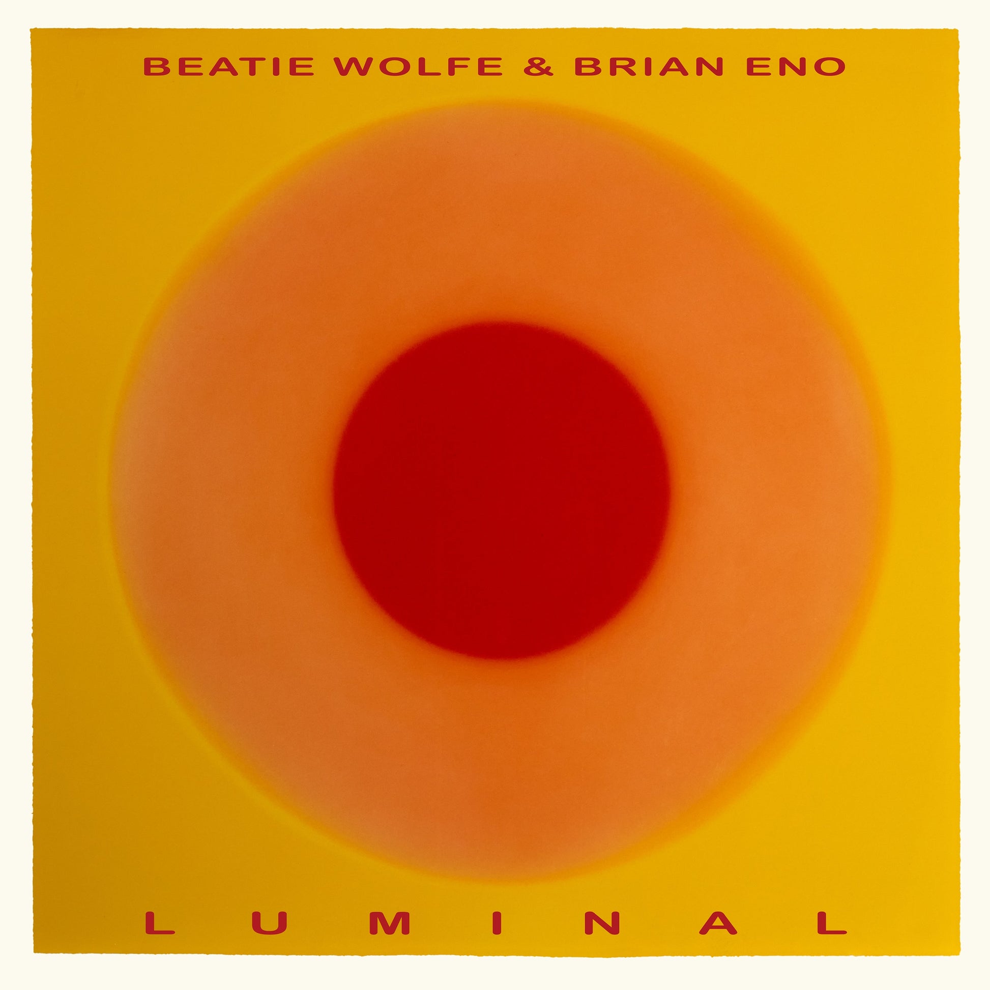 Album cover for "Luminal" by Brian Eno & Beatie Wolfe, with orange concentric circles.
