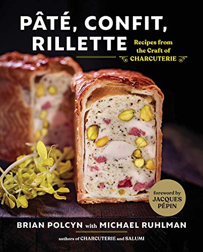 Cookbook cover featuring a sliced pâté en croûte with pistachios and herbs.