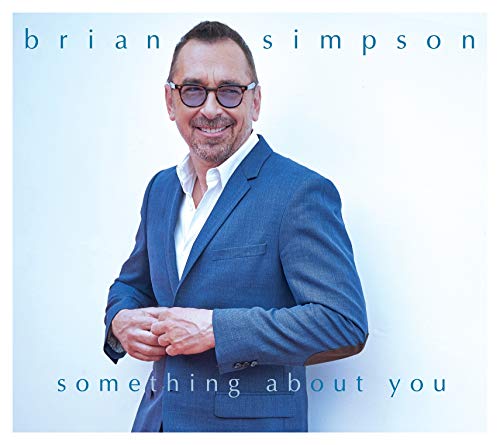CD cover featuring Brian Simpson in a blue suit, smiling.