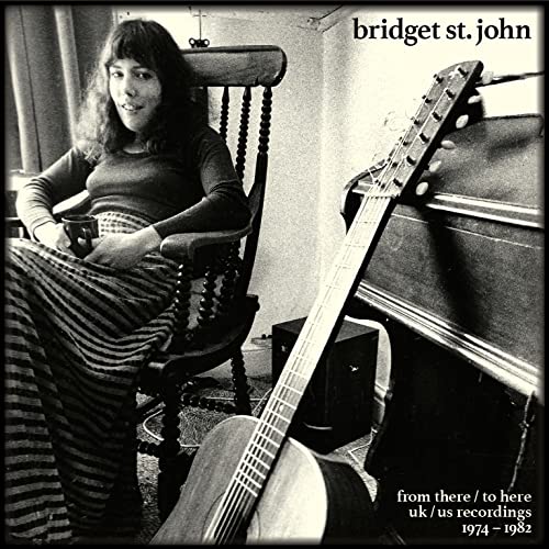 Black and white CD cover featuring Bridget St John with a guitar.