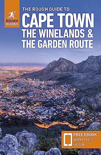 Travel guide cover showing a night view of Cape Town with Table Mountain.