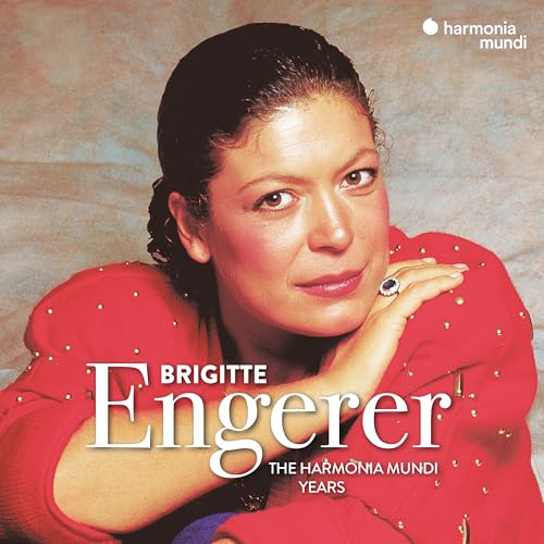 Close-up portrait of Brigitte Engerer, classical pianist, in red.