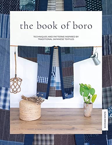Book cover featuring a patched, indigo-dyed Japanese boro robe.