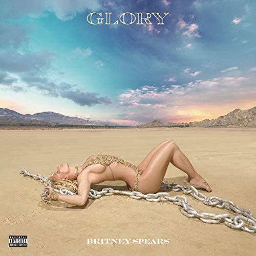 Britney Spears album cover, "Glory," showing her lying with chains in a desert.
