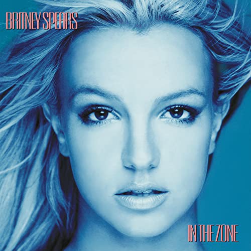 Close-up portrait of Britney Spears on an album cover, blue tone.