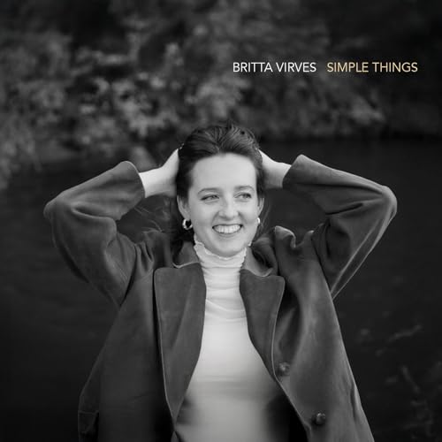 Black and white album cover featuring Britta Virves, smiling and looking at the camera.