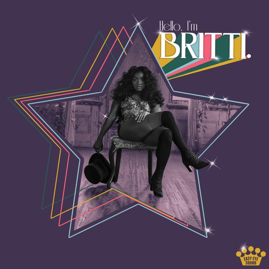 Britti album cover: woman seated in chair, star-shaped frame, purple background.