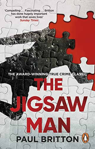 Book cover for “The Jigsaw Man” featuring puzzle pieces and a shadowy figure.